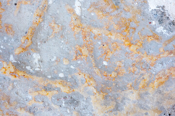 Colours, textures and patterns on a natural stone. Stone background.