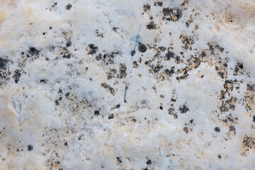 Colours, textures and patterns on a natural stone. Stone background.