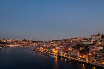 Fototapeta na wymiar View of the Douro river and the city of Porto at dawn in autumn in Portugal