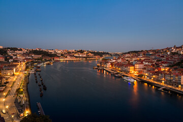 View of the Douro river and the city of Porto at dawn in autumn in Portugal