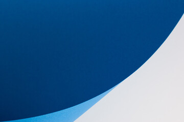 Abstract curved blue and white background