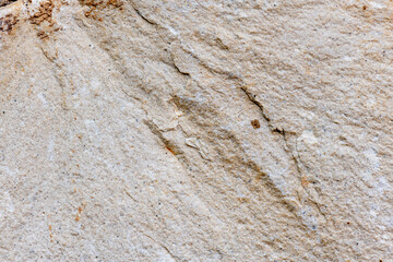 Colours, textures and patterns on a natural stone. Stone background.
