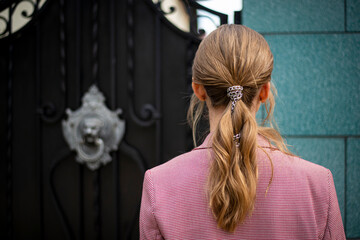 Girl in front of the gates