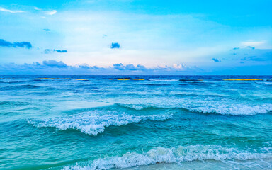 Waves at tropical beach caribbean sea clear turquoise water Mexico.