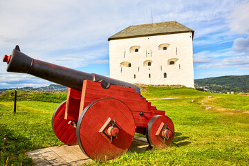 Medieval Kristiansten Fortress and old cannon in Trondheim, Norway