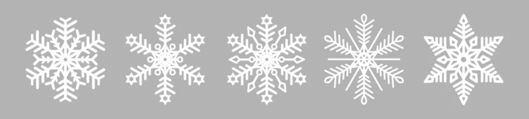 Fotobehang A set of white snowflakes with a gray background. The element of Christmas and New Year. The symbol of winter. Vector illustration. © Helga1