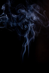 Smoke motion on black background.
