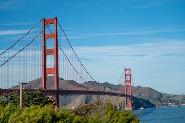 Golden Gate Bridge against the background of bright blue sky. San Francisco, California.