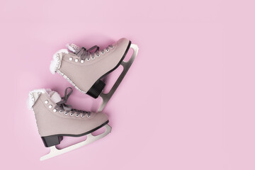 Figure skating blades on a pink background, Female Ice skate boots