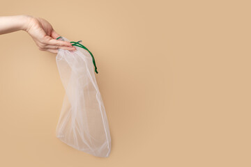 Zero waste shopping,net bag for fruit and vegetables in hand,Fresh healthy food