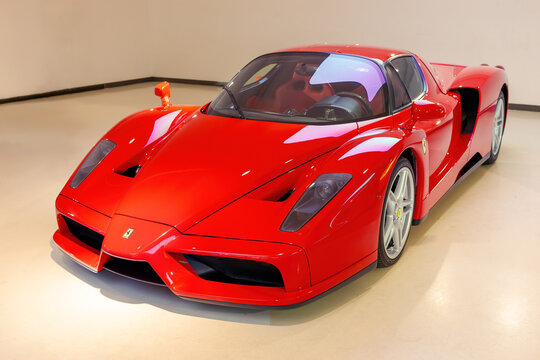 MODENA, ITALY - JULY 23, 2012: Red sport luxury old car FERRARI ENZO series designed at Pininfarina and produced from 2002 to 2004