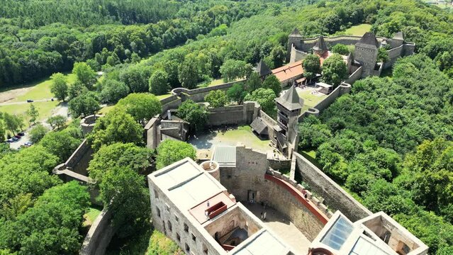 Aerial drone view of the landmark of Helfstyn Castle. Helftyn Castle overlooking the hills where the castle lies during a beautiful sunny day. Located in Czech republic