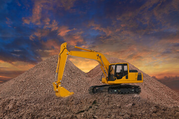Crawler excavator is digging soil in the construction site  , With on  cloud and sky  background.