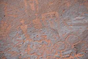 Detail of figures depicted on the wall of the  Sand Island Petroglyph Panel
