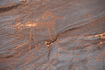 Detail of figures depicted on the wall of the  Sand Island Petroglyph Panel
