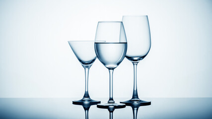 Refreshing drink in elegant stemware with reflective properties.