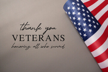 Happy Veterans Day concept - Honoring All Who Served Text with American Flag. November 11.