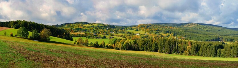 Obraz premium Beautiful colourful autumn landscape. Nature with forest and colourful trees in autumn. Concept for the season and the environment. Blatiny.