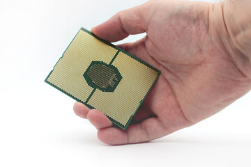 New generation server processor in hand on white background