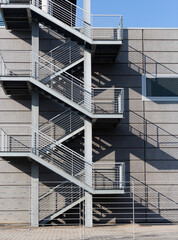 Fototapeta premium Steel emergency stairs in a building