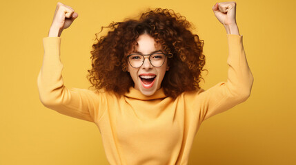 Photo of cheerful funny laughing girl raise fists in victory triumph win in lottery prize isolated on beige color background - obrazy, fototapety, plakaty