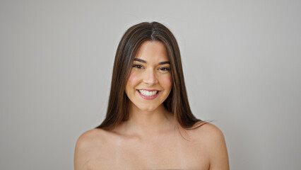 Obraz premium Young beautiful hispanic woman smiling confident standing over isolated white background