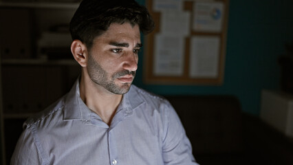 Fototapeta premium Young hispanic man business worker using computer working at the office
