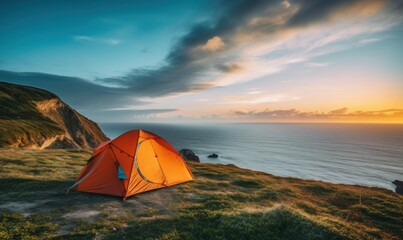 tent set on a top of the cliff on an ocean