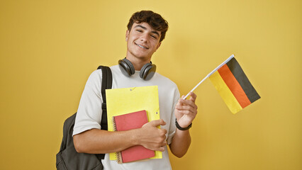 Confident young hispanic man, a german student, stands casual with joy holding books, national...