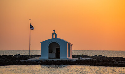 Cretan church at sunset - obrazy, fototapety, plakaty