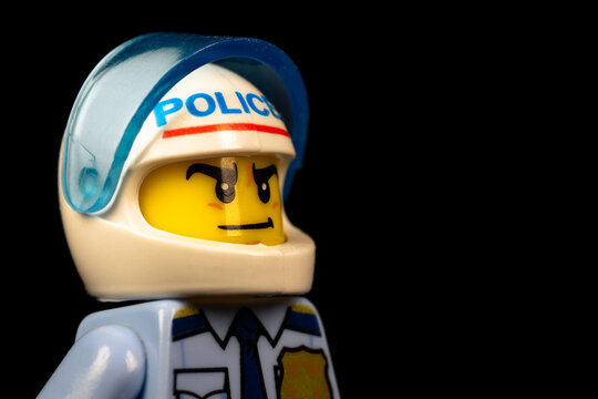 LEGO police officer in white helmet and uniform