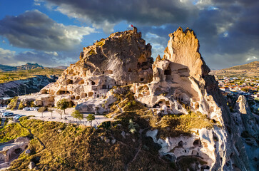 Uchisar Castle in Nevsehir Province in Cappadocia, Turkey - obrazy, fototapety, plakaty