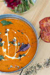 Close-up shot of a beautifully prepared tomato cream soup
