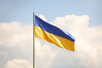 The national flag of Ukraine is developing. Blue and yellow banner. Symbol of the country. Blue sky and yellow ears of wheat. National pride. The rebel liberation army of Galicia. Independence Day