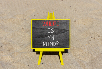 Where is my mind symbol. Concept words Where is my mind on beautiful black chalk blackboard. Beautiful sand beach background. Business, motivational and where is my mind concept. Copy space.