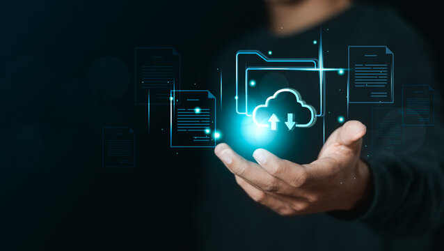Businessman holding database to store files document data digital for document management system (DMS) technology. file storage process with security and information technology concept.