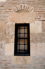 Detail of an old window on the walls of the Yag Mosque in the old town of Seyhan District of Adana Province