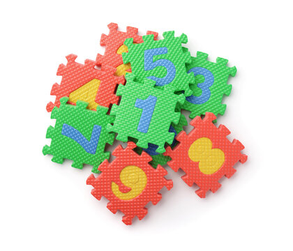 Top view of colorful foam math numbers puzzle