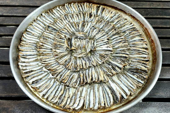 A tray of baked anchovies for lunch or dinner