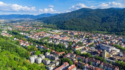 Aerial view of cityscape Freiburg im Breisgau surrounded by buildings