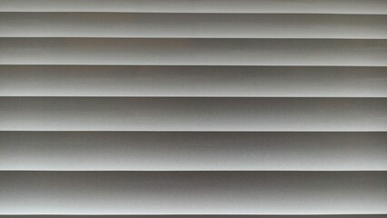 Obraz premium Window blinds with wavy gray striped