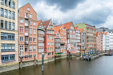 Fototapeta na wymiar Buildings along a canal in Hamburg, Germany