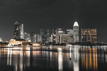 Aerial shot of the Singapore skyline illuminated by the night light.