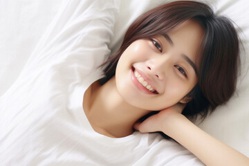 Fototapeta premium An Asian girl with captivating big eyes, a short bobtail hairstyle, and a subtle smile exudes cuteness and innocence against a semi desaturated gray backdrop. Generative AI.