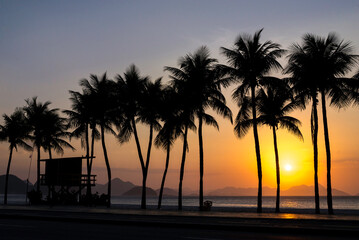 Palm Trees and Lifeguard Post in Copacabana Beach on Sunrise