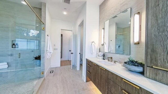 360-degree looping rotational view of a modern luxury residential home master bathroom; seamless loop