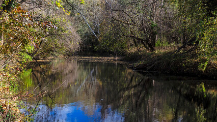 Scenic view of Calumet Creek near Clarksville, Missouri with surrounding landscape reflected in its waters