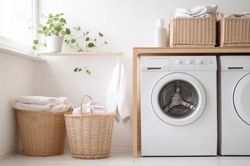 Fotobehang Modern laundry room with natural wicker laundry baskets and washing machine © colnihko