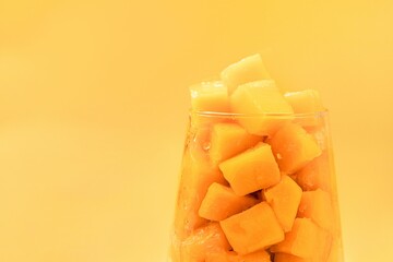 Fresh mango pulp in a glass