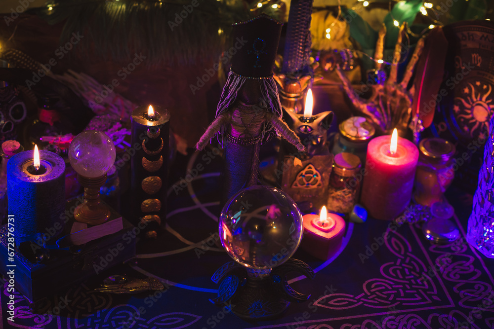 Wall mural Candle lights in dark room. Concept of divination, oracle and predictions, rituals and other magic 